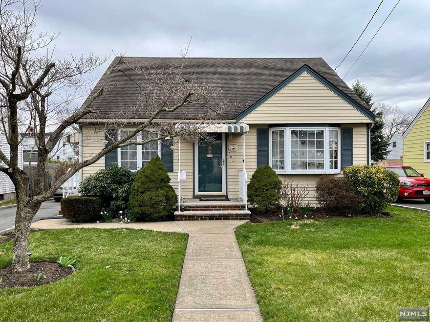 Don't be deceived by the outside.. Lovely 3 BDRM,2 Full Bath Cape .First Floor has an Eat In Kitchen, DR/Den Living Room, Master BDRM and Full Bath. Second floor comprised of 2 additional BDRMS and full bath. Full unfinished basement with a walkout onto a beautiful covered patio and landscaped yard