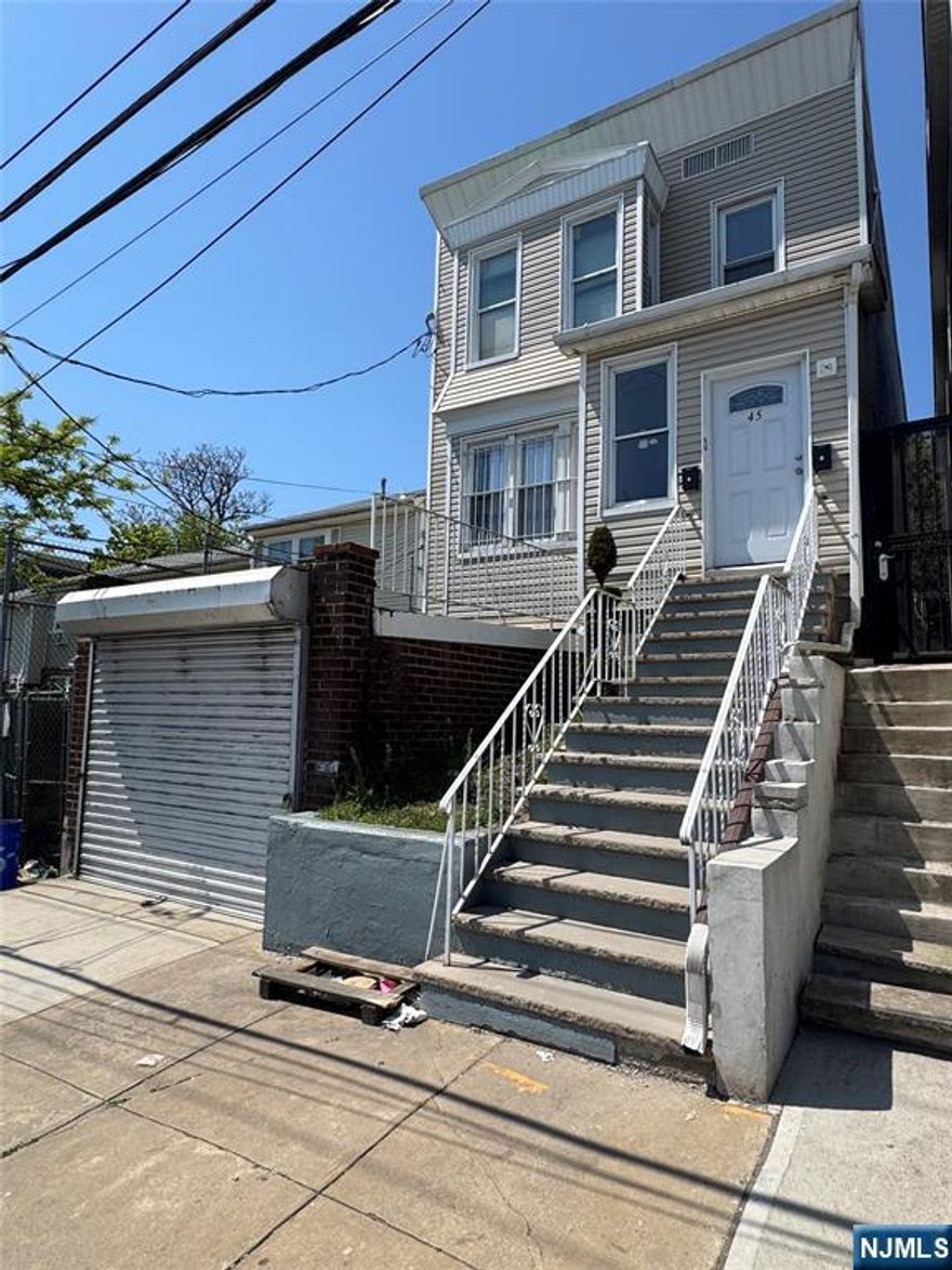 Welcome to this spacious top/bottom 2 family home in Newark NJ! Overlooking the Passaic River with sunrise views. Unit 1 includes Eat in Kitchen, Living, 2 bedrooms, bath & backdoor access to backyard. Unit 2 includes Eat in kitchen, dining, living, 2 bedrooms, bath & back foyer leading to backyard exit. Basement is full, unfinished with washer/ dryer hookups, utilities & garage entrance. 1 car garage included. Home includes central a/c & forced hot air. Hardwood floors / tiling throughout. Tenant pays gas / electric. Owner pays water/ sewer. Windows updated around 2010. A/C, Furnace, kitchens all done around 2010.