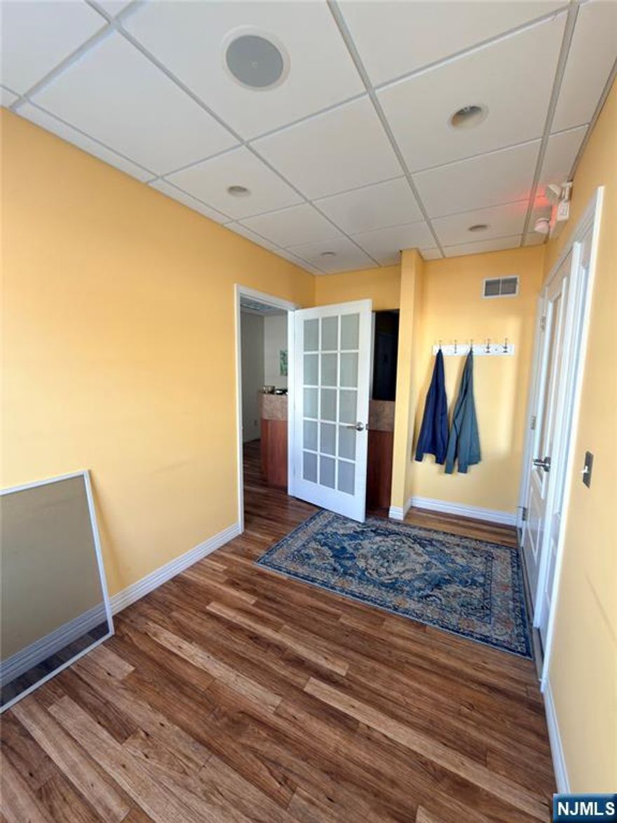 PROFESSIONAL OFFICE SPACE AVAILABLE IN THE HEART OF HARRINGTON PARK. THIS WELL MAINTAINED SPACE FEATURES TWO PRIVATE ROOMS ON THE MAIN LEVEL WITH A PRIVATE BATHROOM. SINKS ARE LOCATED IN ALL ROOMS EXCEPT FOR THE BASEMENT. THE BASEMENT SPACE IS INCLUDED AND CAN BE USED FOR STORAGE, ADDITIONAL WORKSPACE, OR WHATEVER FITS YOUR BUSINESS NEEDS. ONE PARKING SPOT IS INCLUDED. IDEAL FOR MEDICAL, WELLNESS, OR GENERAL PROFESSIONAL USE. CLEAN, FUNCTIONAL, AND READY FOR OCCUPANCY. CONTACT FOR MORE DETAILS OR A PRIVATE SHOWING.