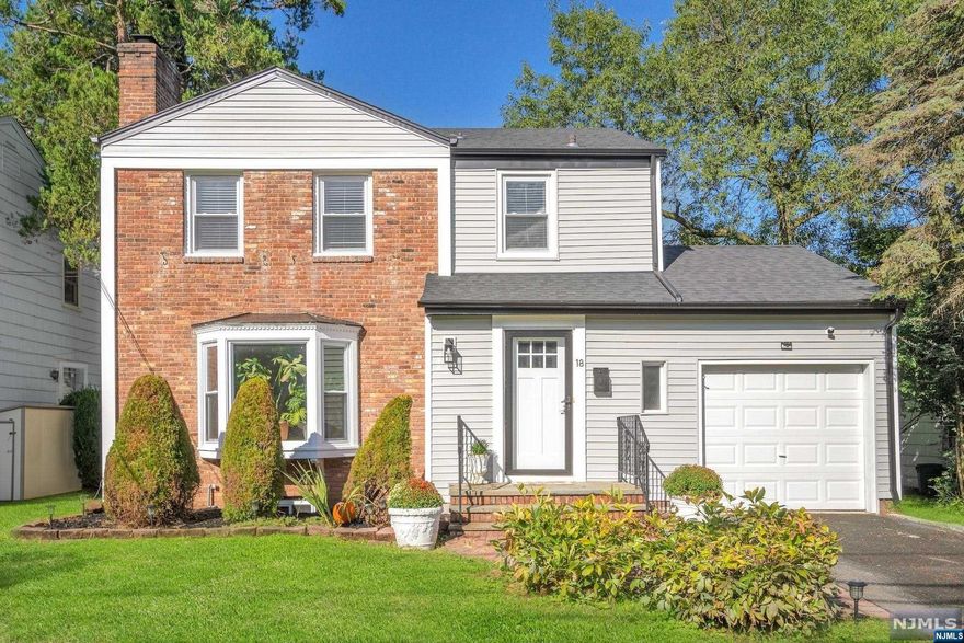 Splendid light-filled colonial style with 3 bedrooms and 2.1 baths situated in ultimate convenient location.Just a few blocks from the Short Hills Train station,NYC bus,downtown Millburn/Short Hills shopping,fine dining,the Springfield Community pool, schools and easy access to all major highways.Large picture windows through out the first floor give an abundance of light.Features large new Eat-in kitchen with granite counter tops & breakfast bar,SS appliances,and lots of cabinets for storage.The living room with decorative moldings and wood-fireplace with a white mantle and powder room.Directly off the formal dining room is a convenient first floor office room.Second floor landing with 3 good sized bedrooms,full bathroom and attic for extra storage.Finished basement with Recreation room, full bath and plenty of room for a home gym,plus Laundry area and storage space.Large backyard.New roof&gutters,siding,windows,kitchen,bathrooms,newer CAC,WaterHter,finished Hwd floors, and more