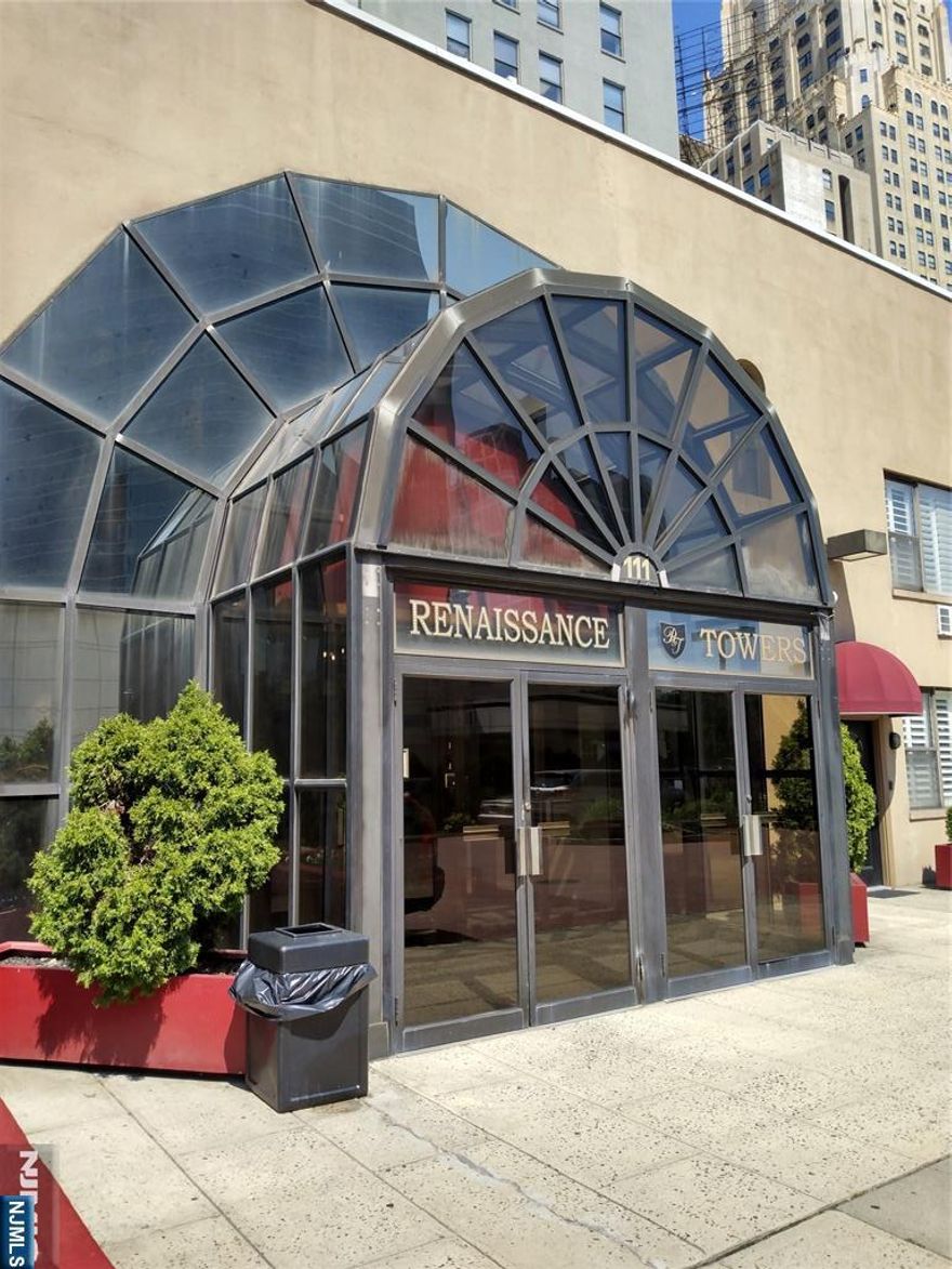 Experience downtown living at Newark Renaissance Towers! This 2-bedroom condo boasts an in-unit washer/dryer , open kitchen and ample closet space. Residents enjoy 24-hour concierge service, a 24-hour on-site fitness center, as well as off street parking (additional fee). Sold AS IS Prime downtown location just steps from Newark Penn Station including Path, Amtrak, New Jersey Transit trains, Light Rail, local buses and Greyhound. Building is close to Rutgers University, Seton Hall Law and NJIT and a short drive to Newark Airport , Rtes 21, 22, 280 and 1 & 9. Walking distance of numerous restaurants, bars, and cultural attractions. Don't miss this opportunity to own a piece of vibrant downtown Newark. Don't miss this opportunity to own a piece of vibrant downtown Newark. Schedule a visit soon.