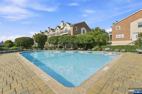 Photo of 200 Grand Cove Way #4J, Edgewater, NJ 07020 (MLS # 26030536)