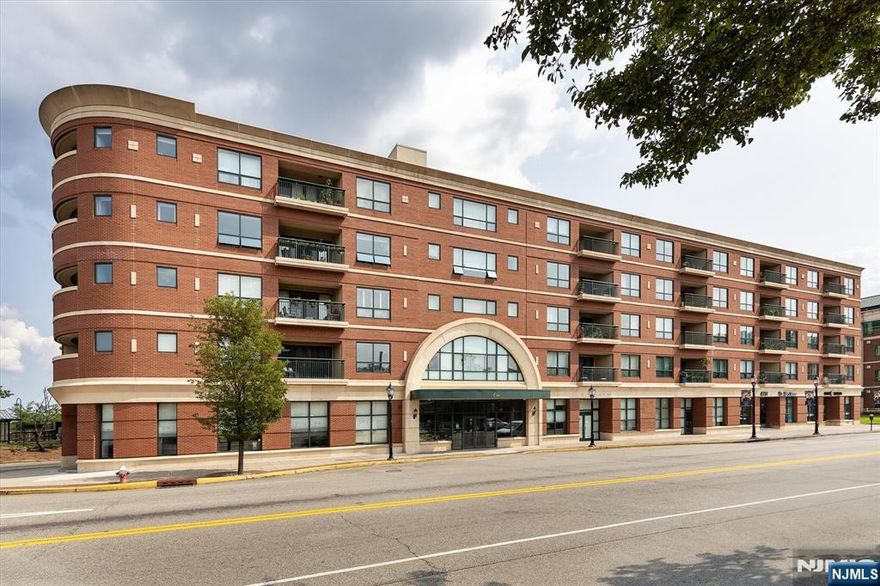 Welcome to this well-maintained, move-in ready 1BR/1FB condo on the second floor, corner unit of Station Square Condominiums located in the heart of Rutherford! Situated steps from the train station & bus stop to NYC, this unit offers ultimate convenience for commuters. This approx 882 SqFt condo boasts a kitchen with stainless steel appliances and open DR and LR layout w/private balcony with Northeast views. The unit comes equipped w/ washer/dryer in unit, central air and plenty of closets. The building features a secure entry lobby, elevator, 24-hour security, indoor garage parking for one car & storage. Enjoy all of the local shops, coffee shops and restaurants Park Ave has to offer at your fingertips! Close to all major highways, American Dream, MetLife Stadium and more!