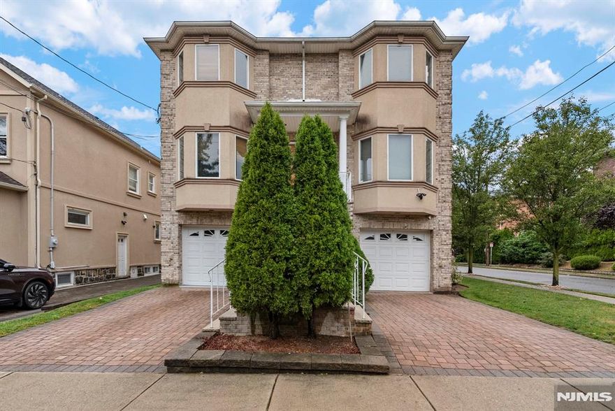 This well-maintained duplex is nestled in one of the most sought-after neighborhoods in Cliffside Park! Just minutes away from Cliffside Park High, Edgewater Commons and an easy NYC commute via NJ Transit or the ferry. This home features an open layout with hardwood floors throughout and access to a private deck. Upstairs includes a primary suite with a standing shower and tub, plus two bedrooms and a full bath. The ground level is equipped with a rec room, full bath, ample storage with direct access to the backyard and garage. Small pets considered.