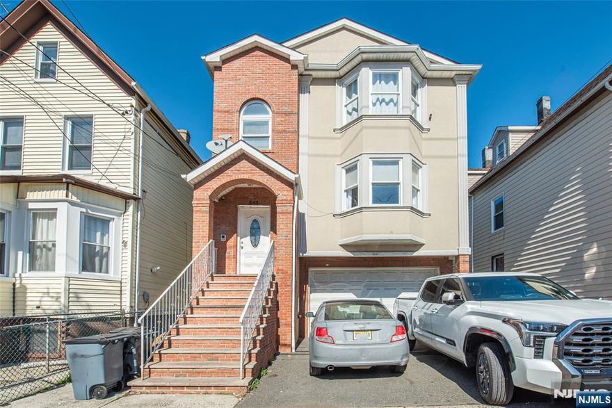 A RARE FIND!!! Welcome to the 2-family home that youâ€™ve been waiting for in the vibrant city of Elizabeth! Constructed in 2011, this property is ideal for owner-occupants looking to offset expenses with a tenanted top floor, but is equally an excellent choice for investors. Offering over 3,250 s.f. of living space, this special property has a total of nine bedrooms and five full baths. The Unit 1 duplex features four bedrooms and two baths on the upper level, plus a finished ground floor with living/dining area, kitchenette, bedroom and full bath â€“ accessed via an interior staircase or by separate private entrance. Top floor Unit 2 mirrors the Unit 1 upper level layout and is occupied on an M-T-M basis by a long-term tenant that would love to stay. Thoughtfully designed for control over utility use, there are separate furnaces, central air units, and gas/electric meters for each of the three levels. Socialize and host barbecues with friends in the ample backyard and create a delightful garden to enjoy. In an area where on-street parking is scarce, there is covered parking for two cars in the garage and room for an amazing four+ cars in the oversize driveway. Enjoy easy access to parks and sports activities, NYC transportation, the NJ Turnpike, Newark Airport, plus shopping destinations such as Jersey Gardens, IKEA, and the near-by boutique retail and enticing restaurants of downtown Elizabeth. Make it your point to come and see this versatile home today!
