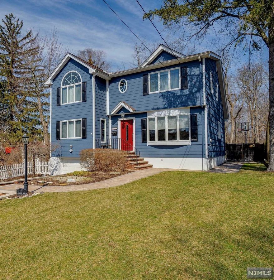 Classic North Caldwell colonial with updated kitchen and baths, spacious closets, and gleaming hardwood floors throughout. Custom Kitchen has center island plus built in separated eating area with bench storage. Relax in the principal ensuite retreat with a walk-in closet, and private bathroom. Bedrooms have generous closet space. The finished basement has entrance to garage with extra storage rooms. Newer furnace, hot water heater, and newly painted. Work or play in this pristine home. There's plenty of space for everyone! Home features a large great room addition, with glass French doors leading to outdoors. Enjoy your morning coffee on the Trex deck alongside the babbling brook, and fenced in backyard. It's ready for you to unpack and move in - just in time to enjoy a dip in the heated, salt water system in-ground swimming Pool. The perfect location - a short drive to Montclair, nearby Mountain Field, county dog park, and hiking trails! Close to town, shopping, restaurants, you