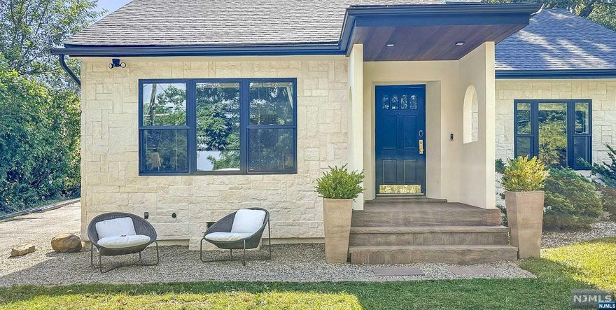 Welcome to this enchanting Spanish-inspired custom home which will charm you instantly with its Mediterranean allure and craftsmanship's quality.Timeless elements such as the stucco and stone facade,arched floor-to-ceiling windows,Travertine tiles and Mallorca inspired ceramics,make this home one of a kind.Step in onto a large and sun filled LR w/ custom made stone fireplace mantel,warm tones & woodwork details.Adjacent sun room is a blissful indoor oasis &features radiant floors.The formal DR preserved traditional details and built-ins while effortlessly blending into a large and modern EIK.Large first floor primary bedroom w/ en-suite bathrm features a spa-like soaking tub and luxurious shower.On the 1st floor another bed and half bath.3rd floor features another huge primary suite w/ en-suite full bathrm & leisure room. Completely finished lower level offers multiple dedicated areas from a proper gym,office,laundry etc.Fenced backyard,2-car Garage,deck,golf course views & more!