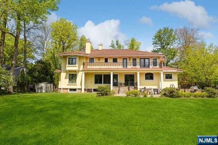 A modern & romantic residence built in 2008 in coveted Closter boasts 7 bedrooms, 6 1/2 bathrooms & endless light throughout. Enter through the entry foyer to find the exquisite main level w/handsome dining area, family room w/fireplace, spacious eat-in-kitchen equipped w/the finest top-tier appliances, center island w/sliders to a lush & landscaped backyard oasis w/gorgeous greenery & a large patio made for entertaining. Two additional bedrooms, full bathroom, powder room, & a mudroom round out main level, while luxury extends to the 2nd floor where you'll find a true primary suite w/enchanting balcony, walk-in-closet, spa-like bathroom & three additional modern & spacious bedrooms w/full bathrooms & walk in closets in two of them. Fabulous lower level is fully finished w/gym, rec area, wet bar, bedroom, & convenient full bathroom. Close to NYC transportation, schools, & parks. A true must see!