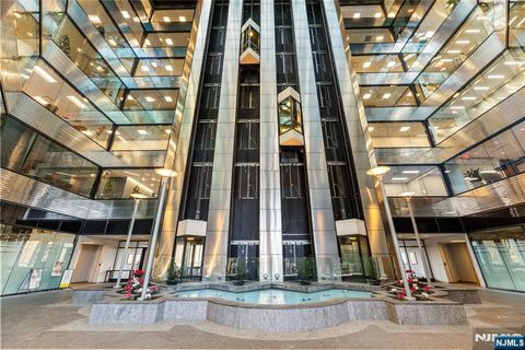 Photo of 500 Frank W Burr Boulevard #150, Teaneck, NJ 07666 (MLS # 25043534)