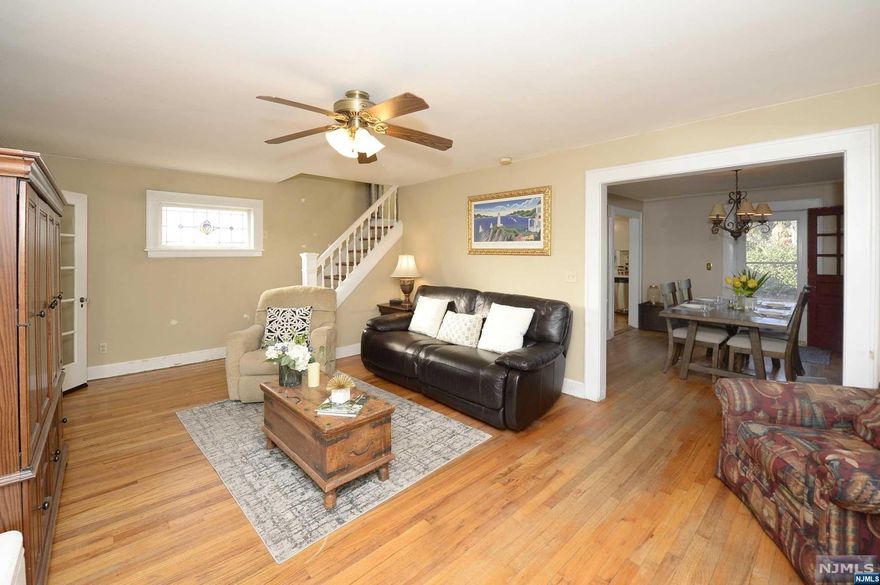 Welcome to this charming colonial-style home that features 3 bedrooms, 1 full bathroom, and 1 half bathroom. As you step inside, you'll immediately appreciate the classic details and timeless elegance of this home, including the beautiful hardwood flooring and cozy fireplace in the inviting living room.The kitchen is functional and offers plenty of counter space and storage options. The adjacent dining area is perfect for meals and entertaining guests. Upstairs, you'll find three well-appointed bedrooms, and a full bathroom. The finished basement adds additional living space to the home and features a rec room, office, laundry room, and utilities. It's perfect for a playroom, home gym, or additional living space. Located in a desirable quiet neighborhood, this home is close to shopping, dining, and entertainment options. If you're looking for a classic home with plenty of charm and character, this colonial-style property is a must-see!