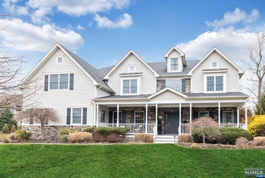 Welcome to this beautiful center hall colonial, on a quiet cul-de-sac. This prime location offers proximity to downtown amenities, NYC transportation, the scenic Celery Farm & more. Enter from the covered porch through the two-story entry where you'll be greeted by the perfect floorplan. Formal dining room leads you through the butler's pantry, to the eat-in kitchen with center island and breakfast area, open to the great room with gas fireplace. A 1st floor bedroom, powder room and formal living room complete this level. Upstairs, discover a tranquil primary suite with walk-in closet, gas fireplace and a spa-like bath. Two bedrooms connected by a jack & jill bath, a junior ensuite, and laundry finish this floor. The lower level is exceptional, equipped with a kitchenette, rec room, gym, playroom and more. Outside, enjoy a private backyard with patio, outdoor kitchen & pergola. A great blend of modern amenities and elegance. Make this home yours.