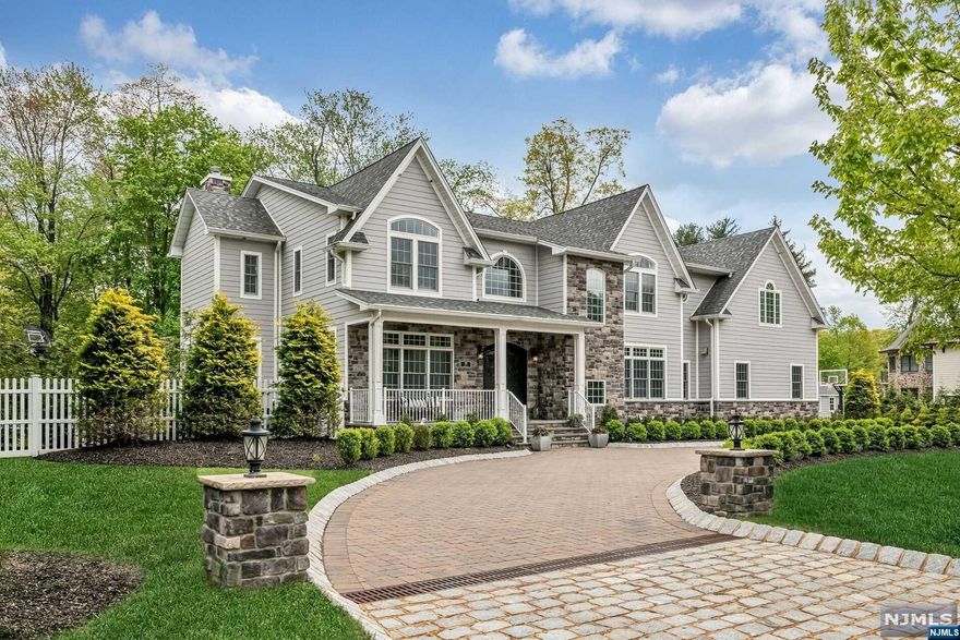 "SIMPLY PERFECT" IS THE BEST DESCRIPTION OF THTHIS ELEGANT HALWORTH HOME SET ON 3/4 OF AN ACRE WITH A STONE CIRCULAR DRIVEWAY. THE PROPERTY WAS TRANSFORMED INTO AN OASIS WITH NEW LANDSCAPING, NEW GUNITE POOL,BLUE STONE PATIO & AN OUTDOOR KITCHEN. BUILT IN 2017 WITH EXTRAORDINARY ATTENTION TO QUALITY & DETAIL THIS HOME SHOWCASING OVER 7000 SQ.FT. OF LUXURIOUS LIVING SPACE. THE FIRST LEVEL SETS THE TONE WITH A GACIOUS 2 STORY FOYER AND 2 STORY GREAT ROOM W/FIREPLACE.THIS LEVEL OFFERS A BANQUET SIZE DINING ROOM,BUTLER'S PANTRY,FORMAL LIVING ROOM,OFFICE OR 1ST FLOOR BEDROOM WITH BATH, SUNROOM W/FIREPLACE,GOURMET KITCHEN WITH BREAKFAST ROOM OVERLOOKING THE PRIVATE GROUNDS, POWDER ROOM & MUD ROOM.THE 2ND LEVEL IS COMPLETE WITH A SERENE PRIMARY SUITE W/NEW LUXURIOUS BATH AND A DREAM CLOSET PLUS 4 ADDITIONAL ENSUITE BEDROOMS.THE LOWER LEVEL OFFERS A RECREATION ROOM,FITNESS AREA, OFFICE, GOLF SIMULATOR W/BAR AND A GLAM ROOM. COMPLETE WITH ALL AMENITIES JUST 8 MILES FROM NEW YORK CITY