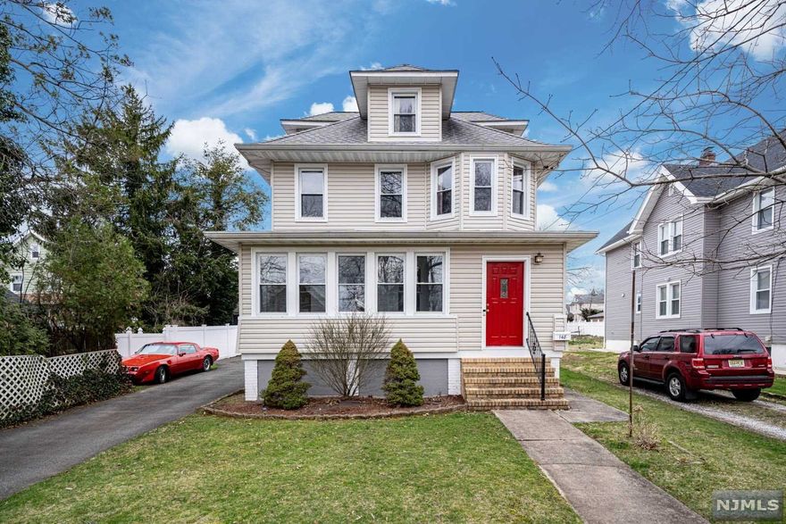 Move right in to 148 Hudson! This beautiful 3 bedroom 3 bathroom colonial has all you need and more! A charming enclosed porch leads you to the foyer, sun drenched living room with wood burning fireplace, dining room and updated kitchen. The first floor is complete with an updated half bath. Downstairs in the basement you will find laundry, spacious rec room and another half bath. Upstairs are 3 spacious bedrooms and a full bath. Outside enjoy the large fenced in well kept yard, a deck, a patio and a 2 car garage for extra storage! High Ceilings, Walk Up Finished Attic, hardwood floors throughout! Close to schools, transportation and shopping! Don't miss this one!