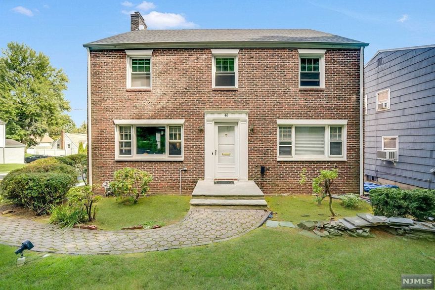 BEAUTIFUL 5 BEDROOM 3.2 BATH COLONIAL. FIRST FLOOR OFFERS TILED FOYER, FORMAL LR, DR, SUNROOM/FAMILY ROOM, EIK & 1/2 BATH.SECOND FLOOR OFFERS MBR,MBTH, BR,BR, BR, FBTH . THIRD LEVEL W FULL CARPETING, BR, FBTH, STORAGE, SKYLIGHTS AND VIEWS OF NYC. FULL FINISHED BASEMENT FOR OFFICE, GYM, REC ROOM,STORAGE, FBTH, LAUNDRY RM AND DOORS THAT LEAD TO A 2 CAR GARAGE W REMOTE CONTROLS. HOUSE OFFERS WOODBURNING FIREPLACE, HARDWOOD FLOORS, DUCTLESS AIR CONDITIONERS, NEW HOT WATER, NEW ROOF, FURNACE APPROX 7 YRS, LARGE DECK FOR ENTERTAINING. WALKING DISTANCE TO JITNEY TO NYC BUS AND TRAIN. CLOSE TO SCHOOLS & SHOPPING AND NYC COMMUTE. A MUST SEE !!