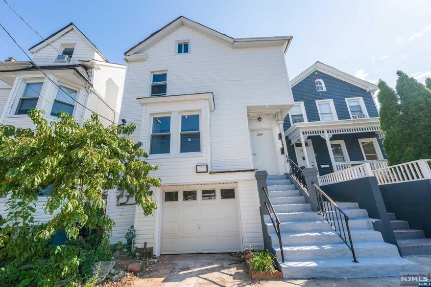 COME GRAB THIS BRAND NEW 2 FAMILY BEFORE IT'S GONE. BEAUTIFUL MODERN KITCHEN WITH QUARTZ COUNTERTOPS, FORCED HEAT, HARDWOOD FLOORS. WASHER DRYER HOOKUP IN THE UNIT, AND CENTRAL AIR COOLING, STAINLESS STEEL APPLIANCES, PLENTY OF NATURAL SUNLIGHT, PARKING GARAGE, PRIVATE BACK DECK, ALL SEPRETE UTILITIES. CLOSE TO SHOPPING AND PUBLIC TRANSPORTATION AND SO MUCH MORE, LOW TAXES. FIRST FLOOR OFFERS: KITCHEN, LIVING ROOM/ DINING ROOM, 3 BEDROOMS, AND 1 FULL BATH. SECOND FLOOR OFFERS: KITCHEN, LIVING ROOM/ DINING ROOM, 3 BEDROOMS, AND 2 FULL BATHS.