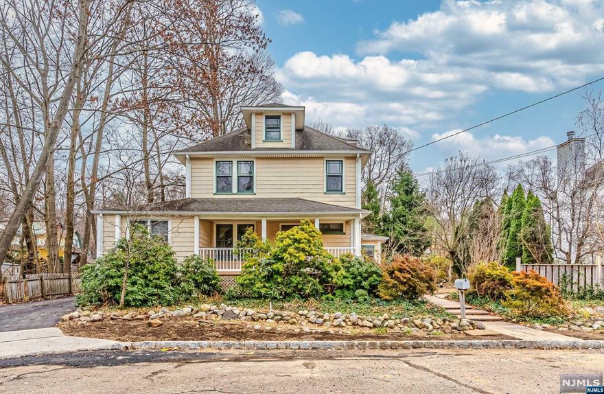 Nestled on the square, this home, constructed in 1914, has gracefully preserved its old-world charm, complemented by an addition completed in 2008. Upon entering, a spacious living room welcomes you, featuring a wood-burning FP that adds a touch of warmth and character. Large formal dining room. Kitchen with granite counters, breakfast bar and separate dining area. 1st floor primary bedroom, w/ sliding doors that open to the yard. Hardwood floors& Parkay. Multi zone CAC was installed in 2010. The 2nd floor full bath is ready for your personal touch and renovation ideas. A full walk-up attic offers possibilities for expansion. Exterior offers a brand-new driveway, composite deck, and a great front lemonade porch! The grounds, perfect for gardening, and the koi pond, ready to be revitalized, offer outdoor tranquility. Downtown Caldwell just steps away, grants you easy access to shops, restaurants, & bus. Little TLC can go a long way!