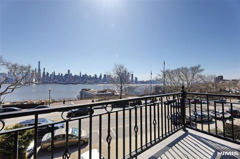 Photo of 1021 JFK Blvd E, Weehawken, NJ 07086 (MLS # 26008320)