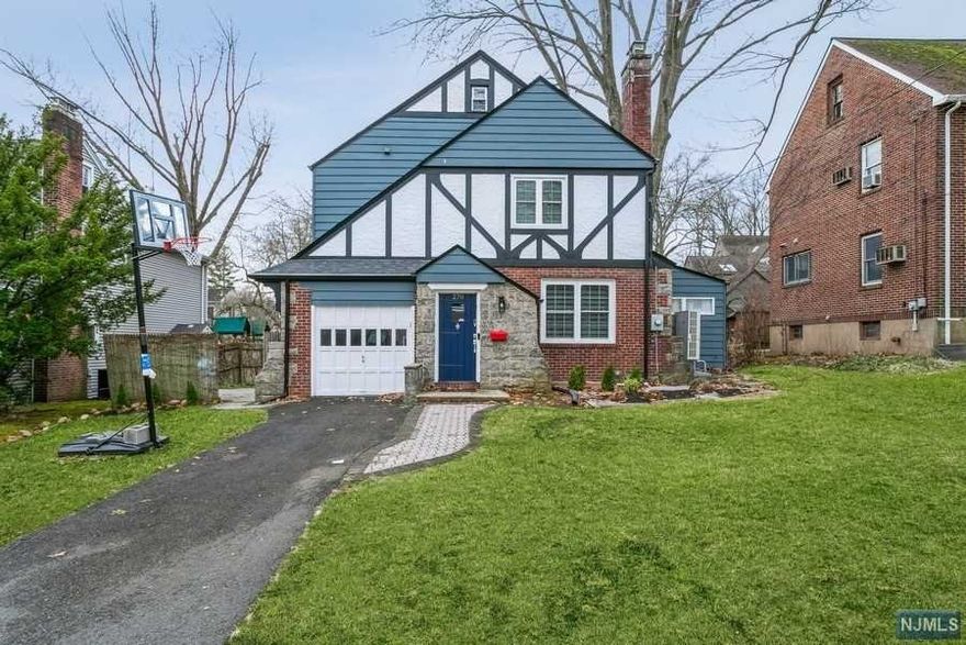 Newly renovated home in perfect location of Teaneck. First floor features formal living room, family room, powder room, modern eat in kitchen, formal dinning room and access to the attached garage and yard. Second floor boasts two bedrooms plus a renovated full bathroom as well as a primary suite with lots of closets and renovated full bathroom. Third floor holds two more bedrooms. Basement has a rec area storage as well as the laundry room. This is a must see. Walking distance to transportation, shopping, houses of worship, parks and so much more. Aside for cosmetic work (bathrooms, floor, and paint) owners did some of the following updates: House has new roof, blown in insulation, new HVAC system and split units in the attic bedrooms and more.