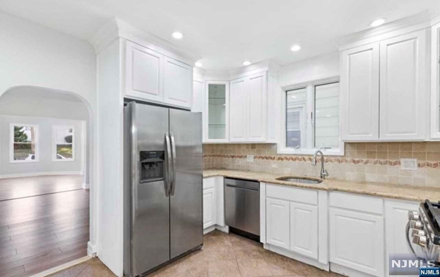 A lovely renovated 3br/3ba in the Hillcrest section of Paterson, boarding Totowa. This property has tons of natural light, open concept with rooms that have their own identity and space. First Floor features, Eat in Kitchen with center Island, Full bathroom, living room and separate dining room. You will also find a deck off of the kitchen and backyard. Second Floor offers, a nice size master bedroom, hall bath and three other Bedrooms. Basement is finished with bath. Low Taxes! Pictures from previous sale.