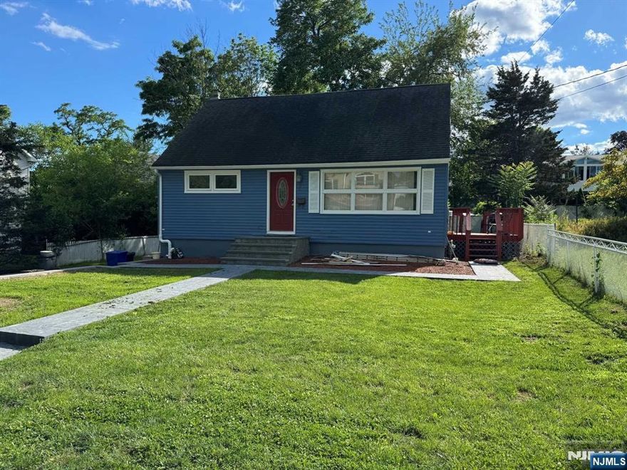 Welcome to this beautifully renovated 4-bedroom Cape Cod home, set on a spacious, level lot. The open-concept living and dining area provides an ideal space for entertaining. This charming home offers four generously sized bedrooms, perfect for peaceful retreats, with two bedrooms on the first level and two on the second floor, all with warm wood floors. Enjoy the convenience of two fully renovated bathrooms with modern finishes. The eat-in kitchen is a chef's delight, featuring stainless steel appliances, beautiful white cabinets for ample storage, granite countertops, and a stylish tile floor, with a rear door that leads directly to the backyard for easy indoor-outdoor living. Recent updates include central air, a new furnace, and a water heater, ensuring year-round comfort and efficiency. Located just one block from scenic Lake Parsippany and within easy reach of Routes 80, 46, and 10 this home is a commuter's dream. Don't miss the chance to make this beautiful property yours!