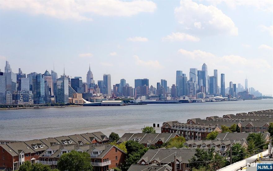 Experience luxury riverfront living with effortless access to Manhattan in this spacious 979 sq. ft. one-bedroom, one-and-a-half-bath residence at Galaxy Towers. Situated on the sixth floor, this sun-filled home captures sweeping Hudson River and Manhattan skyline views while offering convenient proximity to the lobby and parking. The thoughtfully designed layout features hardwood parquet floors and generous living and dining spaces, ideal for both everyday comfort and entertaining. Monthly maintenance includes all utilities, heat, hot water, gas, electric, and water, providing exceptional value. Galaxy Towers is a full-service, pet-friendly community offering resort-style amenities including indoor and outdoor pools, a fully equipped health club, 24-hour doorman, and on-site retail with interior access to all three towers. Garage parking is available. Perfectly located along prestigious Boulevard East atop the Palisades, with express bus service and ferry shuttle nearby, this home delivers refined New Jersey living with New York City just minutes away, at a fraction of Manhattan pricing.