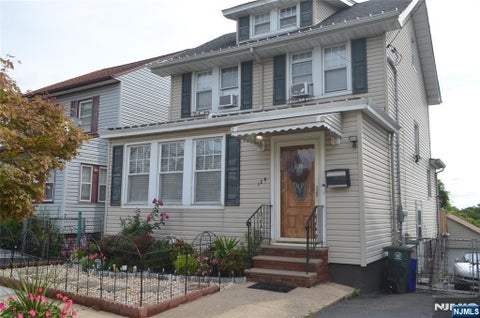 Photo of 128 Hillside Terrace, Irvington, NJ 07111 (MLS # 26034440)