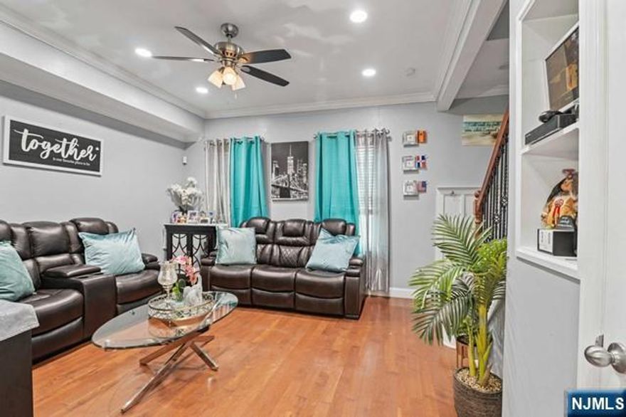 Beautifully renovated single-family home located on a quiet block. This spacious property features 3 bedrooms and 3 full bathrooms, gleaming hardwood floors, and an updated eat-in kitchen with a center island offering additional seating and stainless steel appliances. Enjoy the enclosed porch and a fully fenced yard, perfect for relaxing or entertaining. The finished walk-out basement includes a full bathroom, providing additional living space and flexibility.