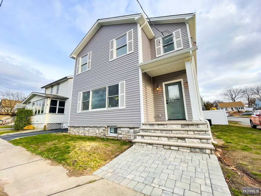 NEW CONSTRUCTION (Existing Foundation) - 2021! LOW TOTOWA TAXES! Welcome to this stunning 2,000 sqf 3 bedroom 2.5 bath colonial featuring 12ft high ceilings, oak hardwood floors, open concept 1st fl, EIK with granite countertop, ss appliance, sliding glass doors to fully fenced in backyard. Second floor takes you to a beautiful master bedroom with vaulted ceilings, walk in closet, luxurious master bath with double sinks, walk-in shower, and small office. 2 additional bedrooms with full bath and laundry complete the 2nd floor. Pull down attic with ample amount of storage. BRAND NEW Multi Zone HVAC System, Anderson Windows, Detached Car Garage, Stone exterior! Highly ranked public schools, close to restaurants, parks, major highways and shopping. Listing Agent related to Seller.