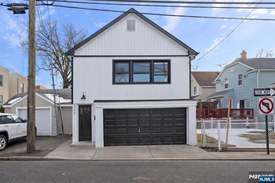 Welcome to this full rebuild on existing foundation single-family home offering a bright, open-concept layout with modern finishes throughout. Built with all new systems, the property includes a NEW HVAC system, water heater, electrical, and plumbing, offering peace of mind and efficiency for years to come. This unique property offers the convenience of condo-style living while maintaining the privacy of your own standalone home. Enjoy the benefits of low-maintenance living without shared walls or common hallways. Additional highlights include a private garage for convenient parking and storage. With extremely low property taxes (~$2,242) no HOA fees, and a convenient location near shopping, dining, and transportation, this home is an excellent opportunity for first-time buyers, commuters, or anyone seeking an affordable home with modern updates. A rare chance to own a private home with the simplicity and affordability often found in condo living.