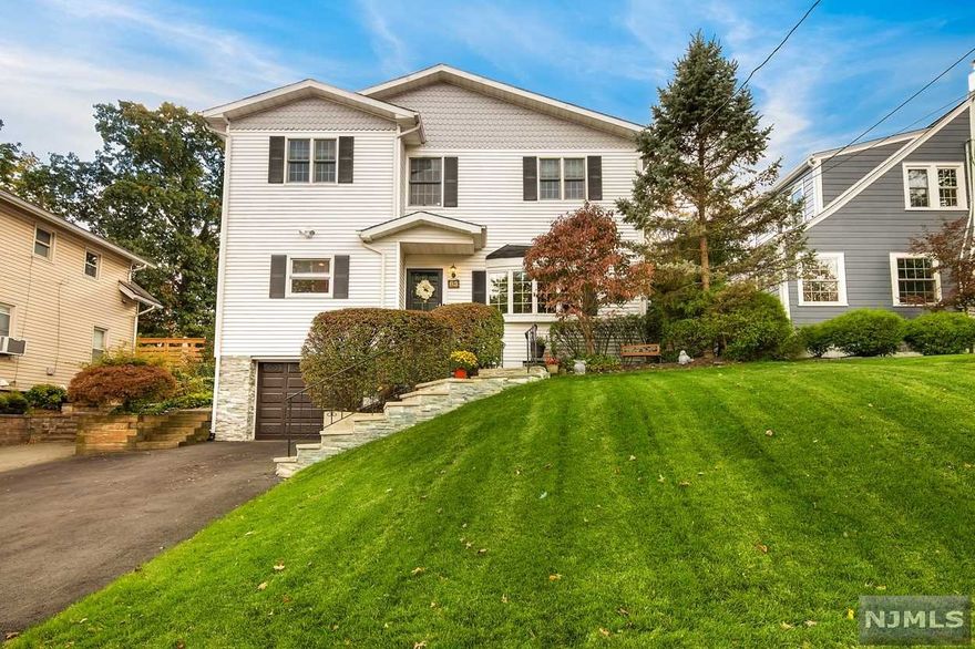 Beautiful and modern 4 bedroom colonial in the desirable North End. Features an open concept floor plan, gorgeous h/w floors, updated eat-in kitchen with granite countertop, marble backsplash, and s/s appliances. Sunny dining room with a bay window, 1st floor laundry, office/den with deck access that overlooks a huge private fenced in yard. Master suite with a walk in closet and a spa like master bathroom.