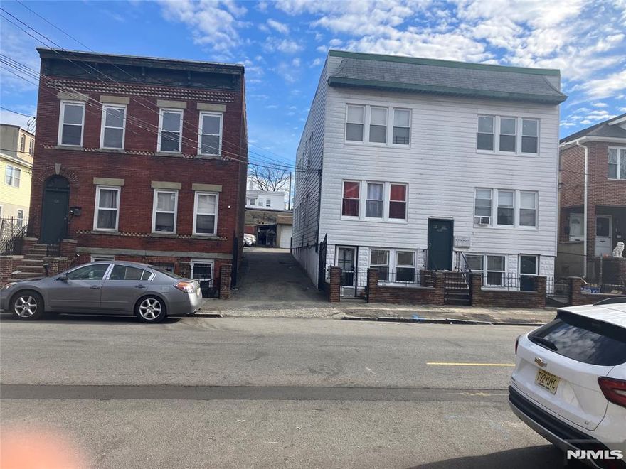 This is an amazing 4-family investment opportunity perfect for owner-occupants or investors. Each unit consists of 2 bedrooms, 1 full Bathroom, a Living Room with hardwood floors and eat-in Kitchen area. Each unit has separate utilities, this property offers the potential for significant rental income. Additionally highlights include 2 separate full finished walkout basement with bathrooms and rooms for storage. The property also includes 4 garages and 5 parking spots. Located near public transportation, schools, and stores. Sold AS" IS"