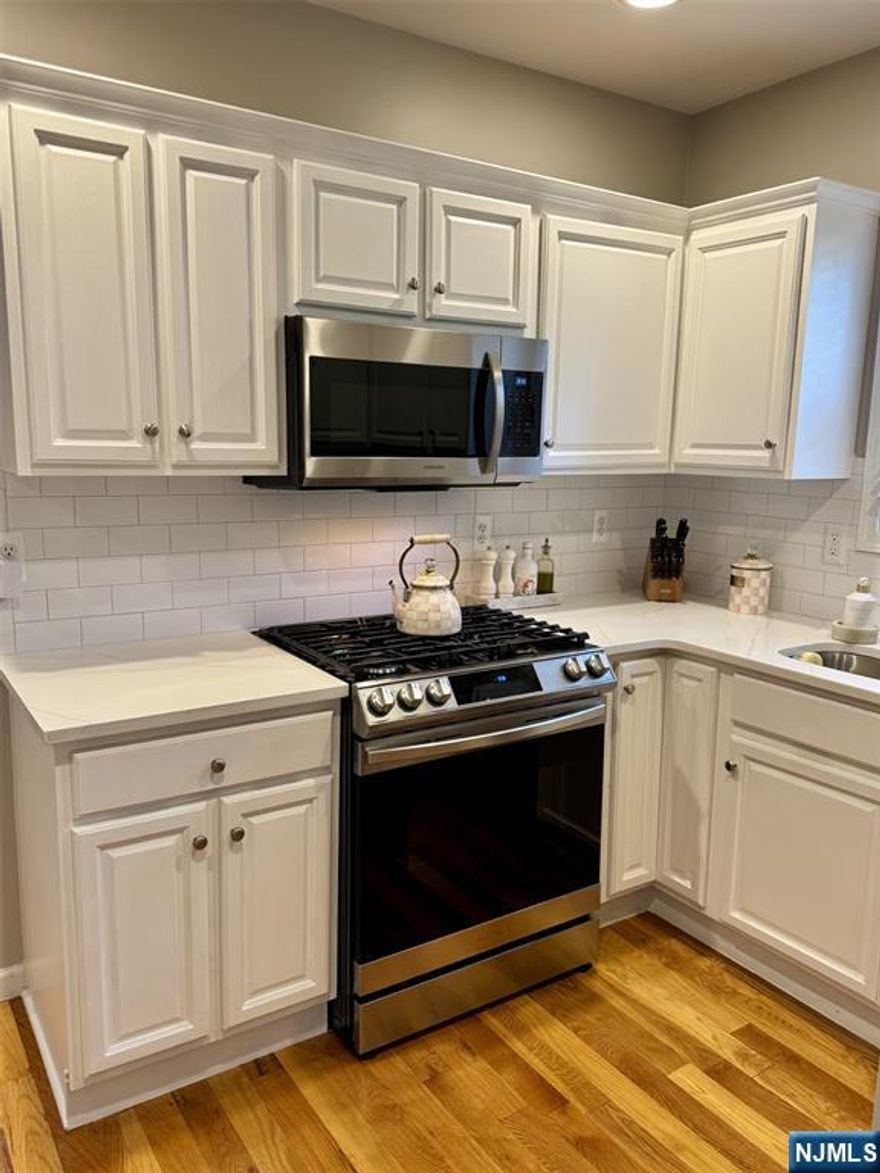 Spacious, recently renovated 3-bedroom rental in a prime Nutley location near public transportation perfect for commuters with no one above you. Enjoy open concept living including dining area, new white kitchen with SS appliances including refrigerator, dishwasher, microwave oven and range over. New tile bath, gleaming hardwood floors, walk in closet, washer/dryer and dedicated storage in the basement, plus two off-street parking spaces available. Close to Nutley Public Schools and the Hackensack Meridian medical school campus, with easy access to township parks, caf s, and Nutley's vibrant downtown for a true lifestyle experience convenience, community, and comfort all in one. Docuverus Tenant Application Required - sory no pets.