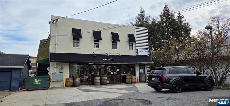 Most highest traffic counts on Rt 46 on both bounds. Commercial building currently occupied by well known Cafe, Eye Brow and office. Plenty of parking available and pylon sign. Must see.