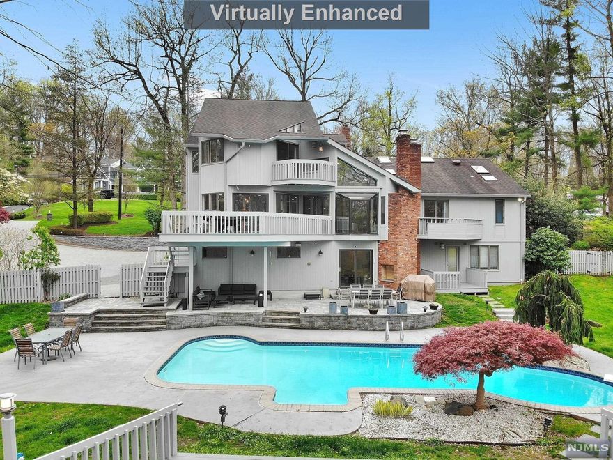 7 REASONS TO BUY THIS LUXURIOUS ONE-OF-A-KIND UPDATED CONTMEPORARY HOME! 1. LOCATION- ON A CUL DE SAC ON ONE ACRE TOTALLY PRIVATE. 2. LIFE-STYLE - LIVE LIKE YOU ARE ON VACATION EVERY-DAY WITH STUNNING POOL SUANA, SUNSETS, AND A BUBBLING BROOK. 3. LUXURY - 6 BRS, 4 FBTHS, UPDATED MODERN LARGE KITCHEN, 5 DECKS. 4. LARGESS - ATTACHED 3 CAR GARAGE, 2 FIREPLACES 5. LOW-TAXES -$33876 6. LIVABLE SPACE - APPROX 4500 S.F 7. LIMITED OFFERING - OF SIMILAR PROPERTIES. BRING UPIR CLIENTS MAKE THEM MOVE NOW OR IT WILL BE TOO LATE!