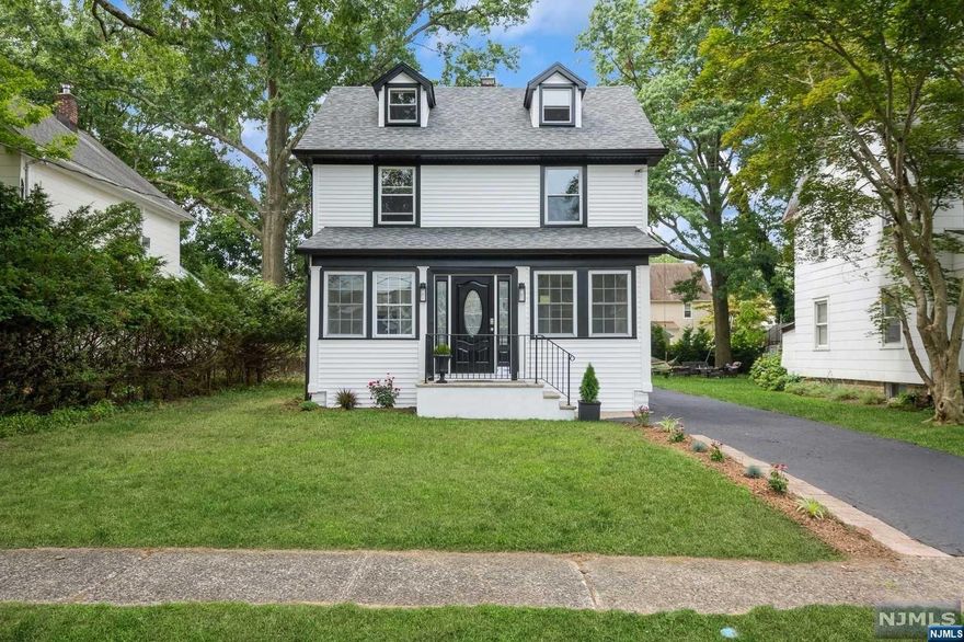 **Charming Renovated Home in Tenafly** Welcome to your beautifully renovated home on a picturesque street in Tenafly, within walking distance to the school, downtown, and transportation. The first floor features a spacious living room, dining room, new kitchen, and updated bathrooms. The second floor offers three additional bedrooms and a modern bathroom. The third floor boasts another generously sized bedroom. The basement is fully finished and sparkling, perfect for additional living space or entertainment. This move-in ready home combines modern updates with classic charm in a prime location. Don't miss this wonderful opportunity!