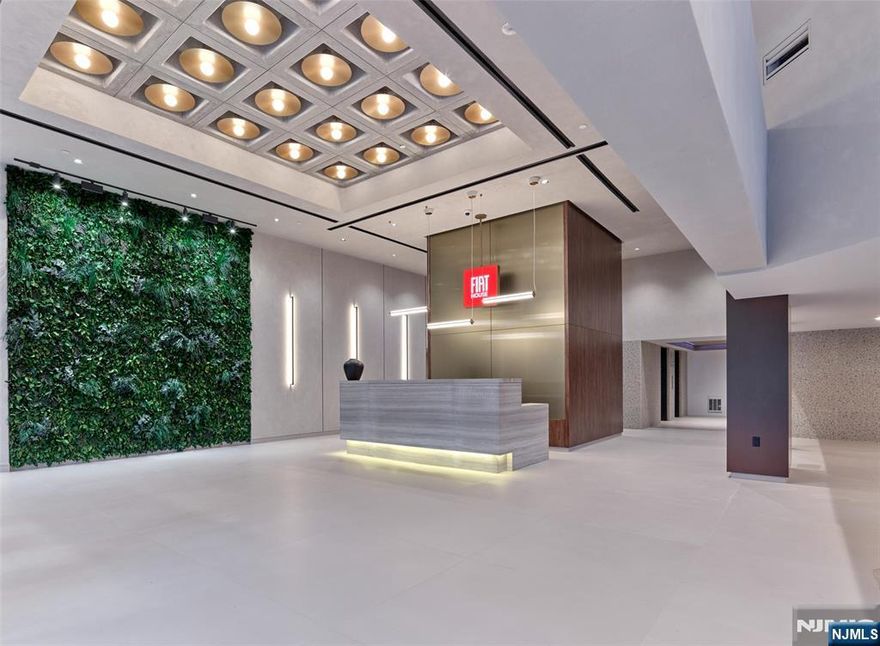 The FIAT House in fort lee, NJ offers an exceptional collection of luxury apartments from studio to 2 bedroom, ideal for those seeking both comfort and convenience just moments from Manhattan. This furnished studio residences include murphy beds for seamless transition from your bedroom retreat to a spacious area for entertaining with an emphasis on sophisticated design, each apartment showcases open layouts, expansive windows, and custom millwork, including panel-ready appliances, functional closets with built-in drawers, and stylish seated islands. Each residence also includes top-of-the-line finishes and a washer/dryer for ultimate ease and convenience. Beyond the interiors, fiat house offers amenities that elevate the living experience. Discover a landscaped rooftop deck featuring BBQ grills, cabanas, and cozy fire-pit seating, providing an ideal space to unwind or entertain while enjoying stunning views. The building also boasts a beautiful courtyard and open green spaces, offering a tranquil escape in the heart of the city. Rentable storage and office spaces are available on every floor, ensuring flexibility for your lifestyle. Fiat house is crafted for those who appreciate modern design and next-level outdoor living, creating a perfect blend of tranquility and urban convenience.