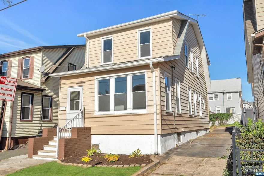 Back on market due to Buyer not being able to perform!!! Close to public transportation, Shopping, Parks, Schools, houses of worship and Direct Access to NYC. Completely renovated from Floor to Ceiling. Upgraded 200 Amp Service, New Hot water Heater & Newly Serviced Furnace. This 3 bedroom 1 and a half bath beauty is ready for any owner occupant or investor to enjoy just in time for the holidays!! First Floor offers a beautifully finished kitchen with quartz countertops, peninsula and brand new Stainless Steel Appliances , Formal Dining room, Living Room, Half Bath, and Sunroom/Office/Bonus Room. 2nd floor features 3 bedrooms, 1 full bath, and Ample Closet space throughout. Home Also Includes a Full Basement, Driveway for 4+ Cars, Great Backyard Space & Inviting Front Entrance. .Property Qualifies for 3.75%, 5k credit and no PMI.