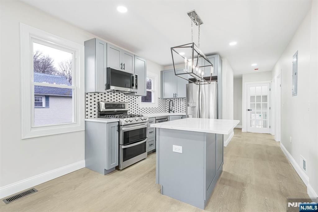 Photo of 16 Grey Rock Avenue, Little Falls, NJ 07424 (MLS # 26001872)