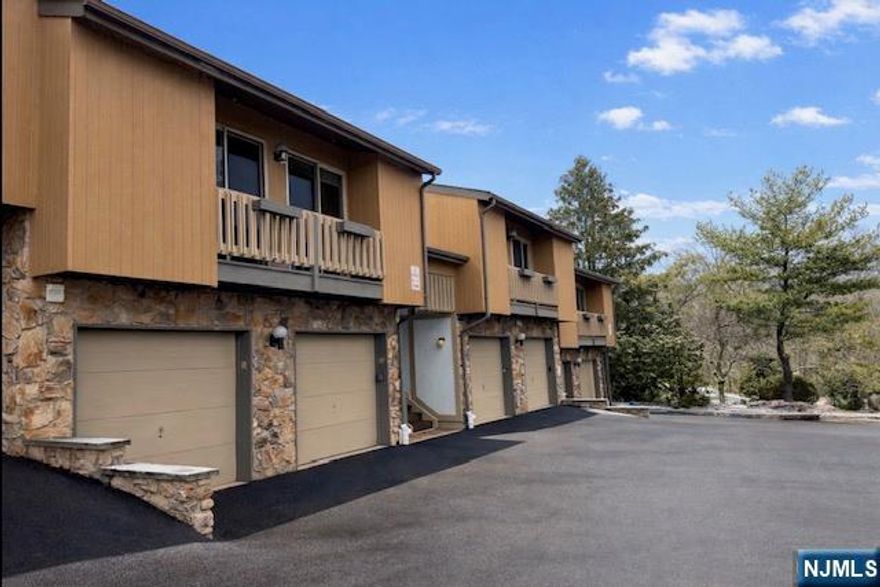 Welcome to Scenic Hill, one of West Orange's most desirable condo communities, offering comfort, convenience, and resort-style amenities. This first-floor one-bedroom, one-and-a-half-bath residence features hardwood floors throughout, a gas fireplace anchoring the living room, and a versatile den ( think tv room, yoga space, home office, guest room) with sliders leading to a private patio perfect for relaxing or entertaining. The kitchen offers tile flooring, and the spacious primary bedroom includes double closets and an updated private bath. A powder room, in-unit laundry, and direct access to a one-car garage add everyday ease and functionality. Scenic Hill residents enjoy a seasonal swimming pool, exercise room, clubhouse, tennis and pickleball courts, creating a true community feel with recreational options right outside your door. Ideally located near Route 280 and major commuting routes, this home offers quick access to NYC-bound transportation, and all that Essex County has to offer. West Orange is known for its beautiful county parks, including the nearby South Mountain Reservation, Turtle Back Zoo, golf courses, parks, and a vibrant mix of shopping, dining, and cultural attractions. A rare opportunity for first-floor living with garage access, outdoor space, and amenities all in a prime West Orange location.