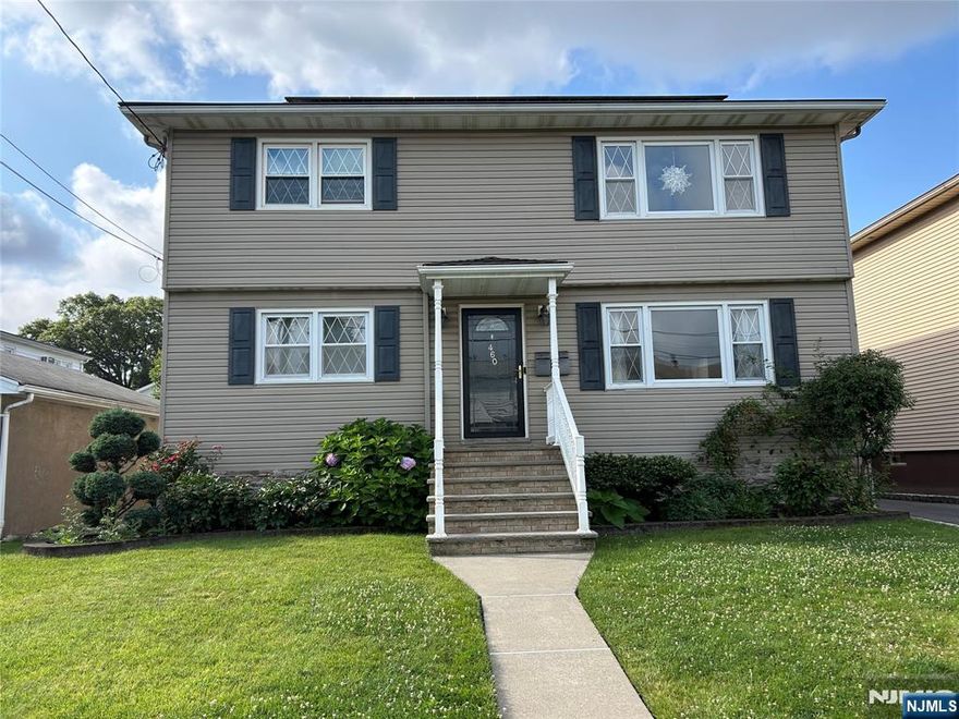 Beautifully updated 1st floor of a 2-story home on a quiet tree-lined street. Spacious open layout includes a bright living room, dining room and stylish modern kitchen with crisp white cabinets, island seating and lots of cabinet and counter space. A tastefully updated full bath and 2 bedrooms round out the 1st floor. Access the ample deck and spacious green backyard through sliding glass doors w/ built in shades where youâ€™ll find plenty of serene and private space to enjoy the seasons. The fully finished lower level has lots of additional living space plus a large dressing room that could turn into an office or craft room. A newer washer & dryer are also in the basement as well as a powder room. Exclusive use of the driveway. Tenant responsible for landscaping and snow removal. Credit check, verification of employment/funds, real estate fee and 1.5 security deposit required.