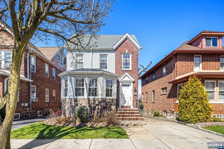 This charming 2 family is located in the highly sought-after Greenmount section of town. Each level boasts a spacious living room, dining room, kitchen, 2 comfortable bedrooms, and a full bath. The third floor includes 2 rooms and a full bath. Hardwood floors throughout and a 2 car garage. The partially finished full basement provides laundry room and door to backyard. This property is being sold as is. Don't miss out on the chance to own this fantastic property in a prime location.