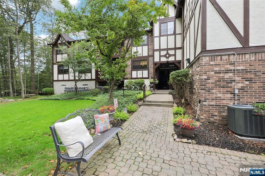 Welcome to this bright and spacious 2-bedroom, 2-bath condo in Mahwahâ€™s desirable Ridge Gardens with bucolic views from every room! Designed for both comfort and flexibility, the layout features an eat-in kitchen for casual meals, a formal dining room for gatherings, and a large living room ideal for everyday living and entertaining. A bonus room adds extra space for a home office, guests, or media area. The primary suite includes a private bath. Both bedrooms have walk-in-closets! A covered balcony provides the perfect spot to relax while enjoying wooded views and bird watching. Unit includes a washer & dryer, private garage and separate storage unit! The community offers resort-style amenities such as an outdoor pool, tennis, and pickleball. Ideally located near parks, Ramapo College, shopping, dining, and transportation, with Campgaw Mountain Ski Area and Darlington Golf Club just minutes away, this home offers a rare opportunity to enjoy both tranquility and accessibility in one of Mahwahâ€™s most sought-after communities.