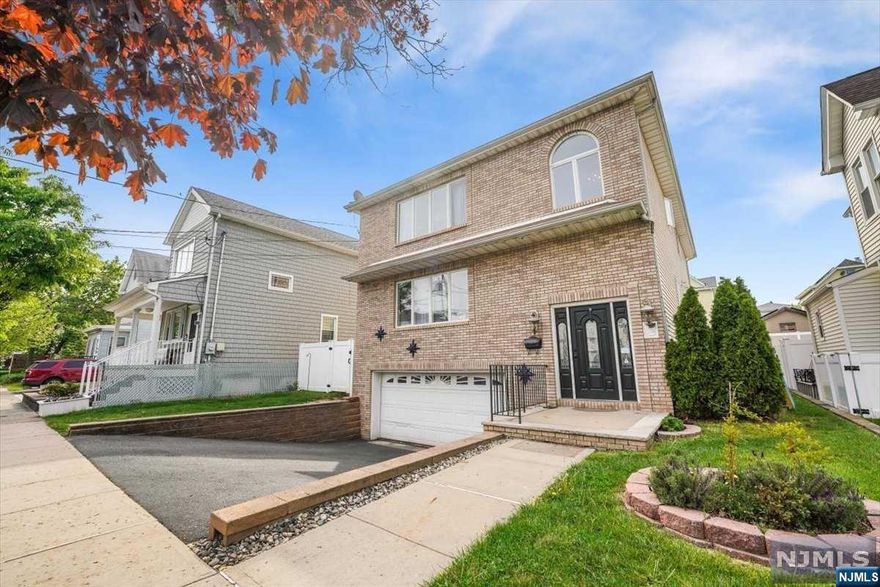 This GRAND (3) story, 2-Fam Home has over 3000 SF of finished living space! Built in 2005 on a tree-lined residential neighborhood just moments away from NYC, train/bus, restaurants, shops and award-winning schools! Relax in your private oasis of a yard w/ above ground pool! Each unit has 3 beds and 2 fullbaths, large dining, Kitchen, Living Room & laundry. The lower level - part of the 1st floor unit has an addt'l room, fullbath and living area. Includes a stainless steel appliances,granite countertops,renovated baths,solid wood floors,recessed lighting,walk-in closets,separate utilities and a huge 2 car garage! An ideal property for owner occupancy. Live in 1 unit and have the rent on the 2nd unit help pay your mortgage. Or rent both and add a desirable investment to your portfolio. Carlstadt has a vibrant history, historical architecture, excellent school system, award winning library, abundant recreational facilities and a location w/out exception! Don't hesitate on this one!