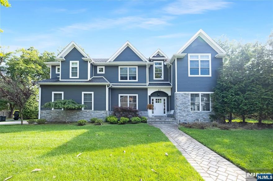 Welcome to 27 Central Avenue, Demarest, NJâ€”a distinguished residence offering an exceptional blend of comfort and sophistication. This expansive home features four bedrooms and five and a half bathrooms, providing ample space for family living and entertaining. The property is equipped with three zones of HVAC and multi-zone baseboard heating, ensuring optimal climate control throughout the year. The new foundation and state-of-the-art security system offer peace of mind and reliability. Culinary enthusiasts will appreciate the outdoor kitchen, complete with a fire pit and bar, perfect for hosting gatherings. Inside, the gas fireplace adds warmth and ambiance to the two-story family room, creating a welcoming atmosphere. The first floor boasts a stylish bar, ideal for entertaining guests. The basement is a versatile space, featuring a bonus office, a gym, and a second living room, catering to a variety of lifestyle needs. Stainless steel appliances in the kitchen ensure functionality and modernity. The multi-zone sprinkler system maintains the lush landscaping, enhancing the property's curb appeal. Located in the desirable community of Demarest, this home offers a harmonious blend of luxury and practicality. Experience the pinnacle of refined living at 27 Central Avenue, where every detail has been thoughtfully designed to meet the needs of discerning homeowners.