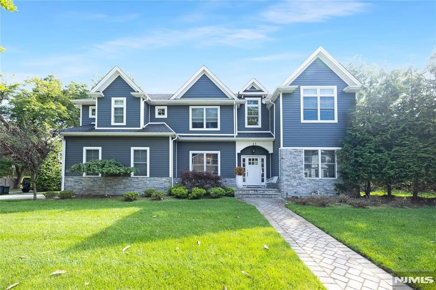 Welcome to 27 Central Avenue, Demarest, NJâ€”a distinguished residence offering an exceptional blend of comfort and sophistication. This expansive home features four bedrooms and five and a half bathrooms, providing ample space for family living and entertaining. The property is equipped with three zones of HVAC and multi-zone baseboard heating, ensuring optimal climate control throughout the year. The new foundation and state-of-the-art security system offer peace of mind and reliability. Culinary enthusiasts will appreciate the outdoor kitchen, complete with a fire pit and bar, perfect for hosting gatherings. Inside, the gas fireplace adds warmth and ambiance to the two-story family room, creating a welcoming atmosphere. The first floor boasts a stylish bar, ideal for entertaining guests. The basement is a versatile space, featuring a bonus office, a gym, and a second living room, catering to a variety of lifestyle needs. Stainless steel appliances in the kitchen ensure functionality and modernity. The multi-zone sprinkler system maintains the lush landscaping, enhancing the property's curb appeal. Located in the desirable community of Demarest, this home offers a harmonious blend of luxury and practicality. Experience the pinnacle of refined living at 27 Central Avenue, where every detail has been thoughtfully designed to meet the needs of discerning homeowners.