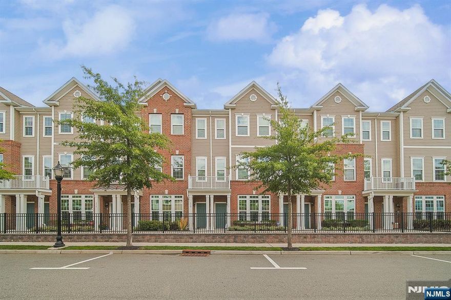 Spacious and well-maintained 3-bedroom, 2.5-bath townhome in the desirable Liberty Square at Wesmont Station. This unit occupies the 2nd and 3rd floors of a tri-level building and features a bright, open-concept layout with a large living/dining area, eat-in-kitchen with 42" maple cabinets, quartz countertops, stainless steel appliances, and private balcony. The top floor includes a primary suite with walk-in closet and private bath, two additional bedrooms, a full bath, and in-unit washer/dryer. Entry foyer and private garage are located on the ground level. Close distance to NJ transit bus stop & WESMONT train station, close to restaurants, highways, shops, schools, parks & more!