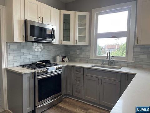 Photo of 125 Marsellus Pl #2, Garfield, NJ 07026 (MLS # 26010647)