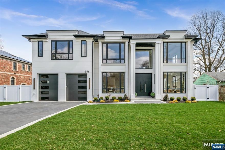 Absolutely stunning brand new construction masterpiece by one of Paramusâ€™ premier builders, showcasing exquisite finishes and exceptional craftsmanship throughout. This classic center hall colonial offers 6 bedrooms and 6.5 bathrooms, highlighted by a dramatic double-height entrance foyer with a showstopping curved floating staircase that creates an unforgettable first impression. Formal living and dining rooms flank the foyer, while the stunning European-style kitchen with a huge center island opens seamlessly to the great room with fireplace, creating an ideal layout for everyday living and entertaining. Expansive windows throughout flood the home with natural light. A first-floor bedroom with full bath offers the perfect setup for guests or a home office. Upstairs, all bedrooms are en-suites, including a dreamy primary suite with two walk-in closets and a spa-like bath with soaking tub and oversized shower. Three additional junior suites and a convenient second-floor laundry complete the upper level. The fully finished basement is absolutely gorgeous, featuring a huge rec room, bar, movie theater, sixth bedroom, and full bath. Set on a large, flat, fully fenced backyard in the heart of Paramusâ€™ desirable east side, close to shopping, schools, and everything the community has to offer.