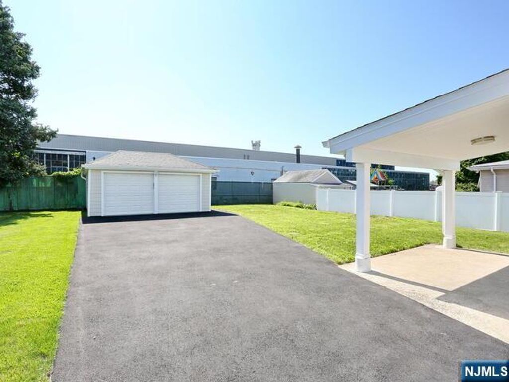 Photo of 51 Pomona Avenue, Fair Lawn, NJ 07410 (MLS # 25043129)