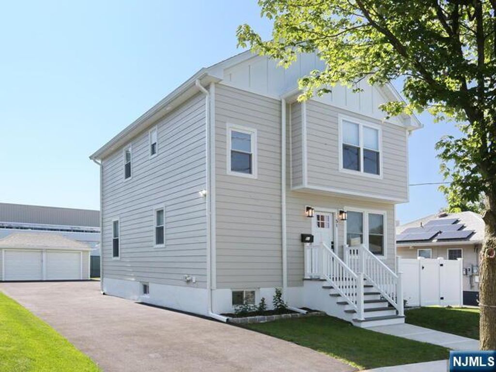 Photo of 51 Pomona Avenue, Fair Lawn, NJ 07410 (MLS # 25043129)